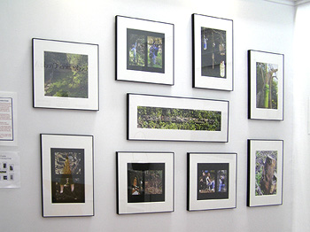 photo of one wall of exhibit showing photos