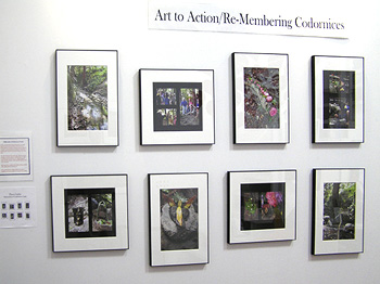  photo of one wall of exhibit showing photos 